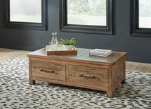 Load image into Gallery viewer, Randale Distressed Brown Coffee Table